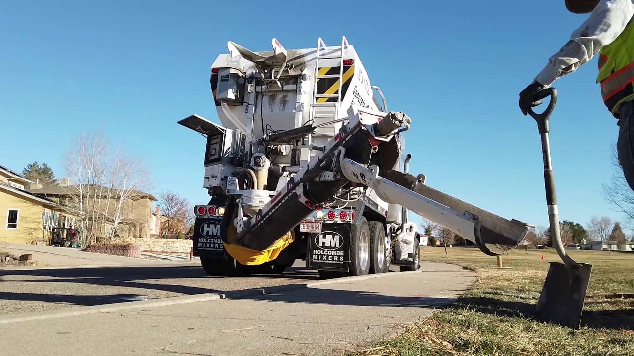 Lucky Dog Contracting uses Holcombe mobile concrete mixers, pouring concrete on residential and commercial jobs